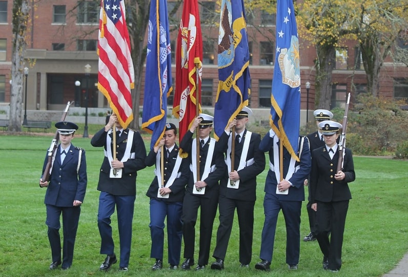 Photo: Oregon State University hosted a Veterans Day Ceremony 10 November 2016 in the Memorial Union Quad. Credit: Theresa Hogue; Oregon State University; Wikimedia Commons.