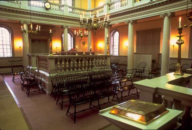 Photo: the interior of the Touro Synagogue, Newport, Rhode Island, built in 1763. Declared a National Historic Site in 1946, it is still in use today. Credit: National Park Service Digital Image Archives; Wikimedia Commons.
