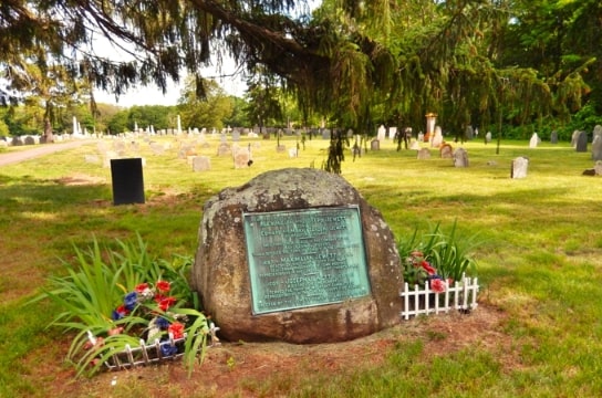 Photo: a memorial stone and plaque dedicated to brothers Joseph and Maximilian Jewett in Rowley, Massachusetts. Photo taken by Cosmos Mariner. Credit: Historical Marker Database.