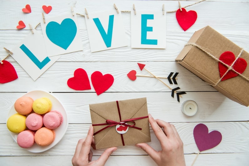 Photo: love with gift boxes for Valentine’s Day.
