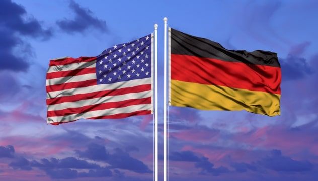 Photo: German and American flags. Credit: https://depositphotos.com/home.html