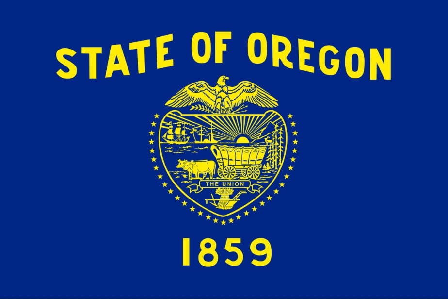 Illustration: Oregon state flag. Credit: Wikimedia Commons.