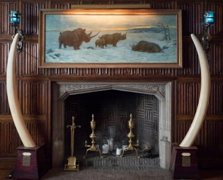 Photo: fireplace on the first floor of the Explorers Club in New York City. Credit: Rhododendrites; Wikimedia Commons.