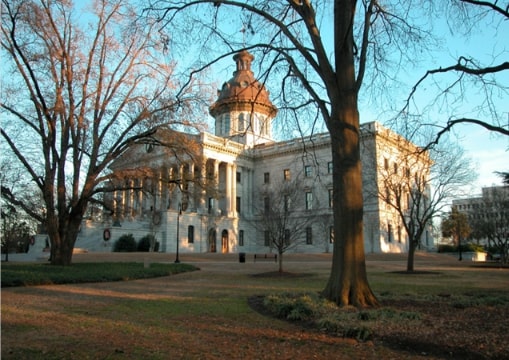 Photo: the South Carolina State House, Columbia, South Carolina. Credit: Nikopoley; Wikimedia Commons.