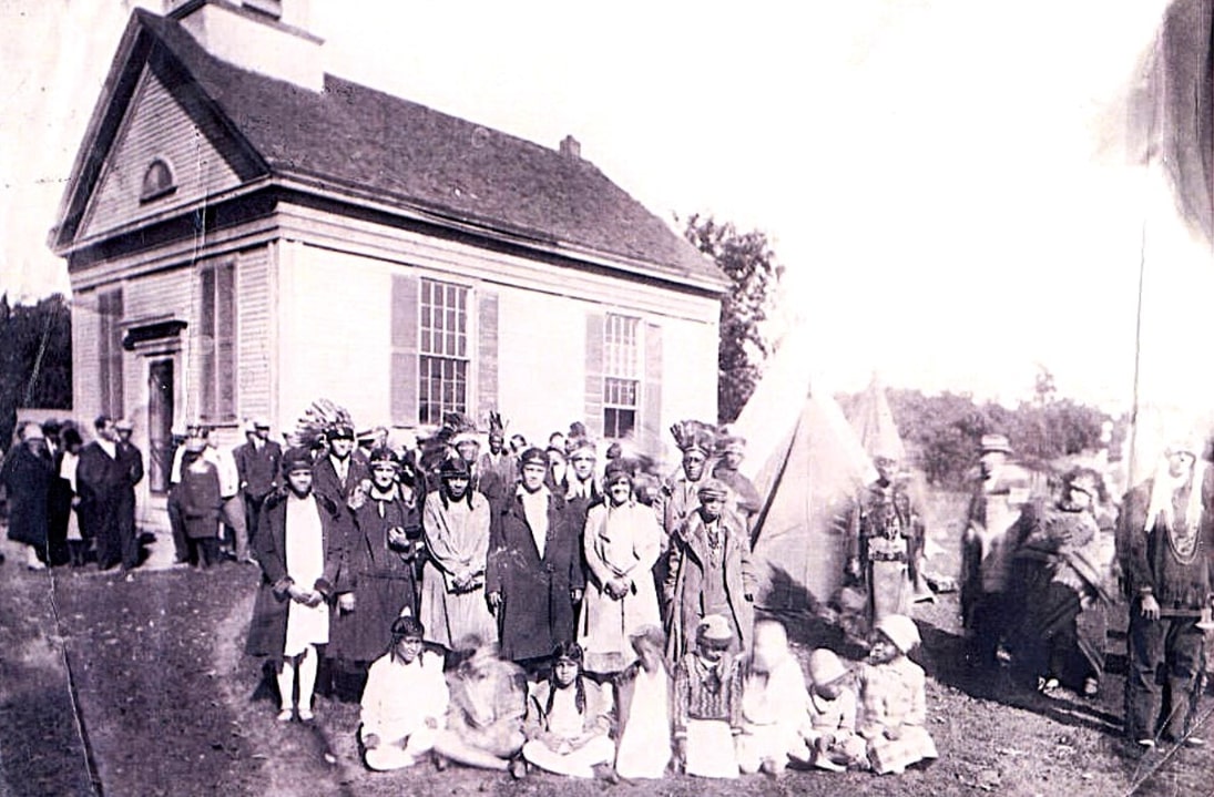 Photo: gathering at Herring Pond Indian Church in Cedarville. Credit: Digital Commonwealth.