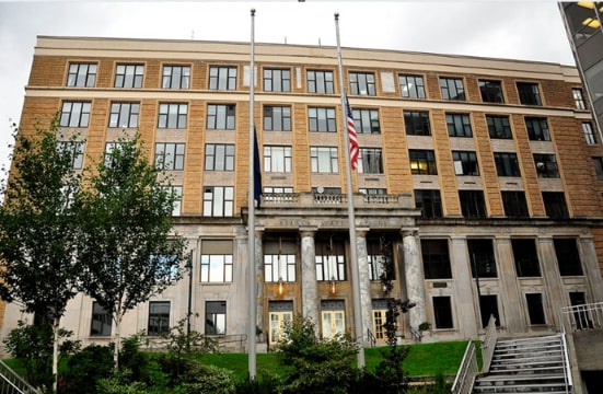 Photo: the Alaska Capitol, Juneau, Alaska. Credit: Kimberly Vardeman; Wikimedia Commons.