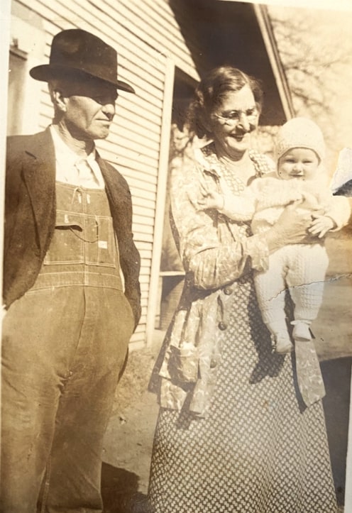 Photo: Perry Oscar Ginn with his wife Kathryn (Bangs) Ginn holding their granddaughter, Catheryn Joan Herr. Credit Denise Luitwieler.