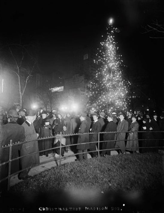 Photo: spectators gathered at the Madison Square Park Christmas tree, 1912. Credit: Bain News Service photograph collection, Library of Congress, Prints and Photographs Division.