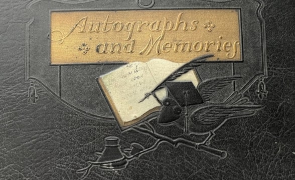 Photo: close-up of the cover of a 1945 school memory book. Credit: Gena Philibert-Ortega.