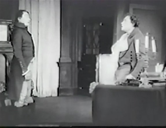 Photo: a still from the film “The Student of Prague,” where the student Balduin faces his double, 1913. Credit: Hanns Heinz Ewers and Stellan Rye; Wikimedia Commons.